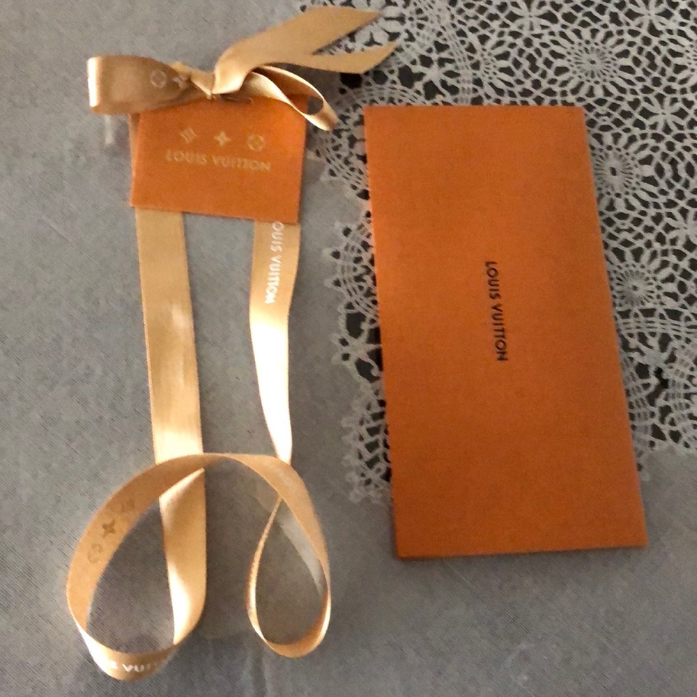 Louis Vuitton gift receipt with bow